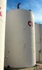 Used Highland Tank, 16,920 Gallon, Carbon Steel, Vertical. Approximately 12' diameter x 20' straight side, slight coned top, flat bottom. U.L. 142 labeled for above ground flammable storage. Openings...