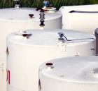 Used Highland Tank, 16,920 Gallon, Carbon Steel, Vertical. Approximately 12' diameter x 20' straight side, slight coned top, flat bottom. U.L. 142 labeled for above ground flammable storage. Openings...
