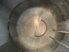 Used Highland Tank 10,000 Gallon Vertical Carbon Steel Single Wall Storage Tank.  Flat top and cone bottom, 1/4