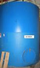 Used  International Production Specialists 7000 Gallon Verical Carbon Steel Storage Tank. Coned top, flat bottom. 123