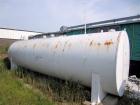 Used International Production Specialists Tank, Approximately 30,000 Gallons. Double wall, carbon steel, horizontal, flat heads.  12' Diameter x 490