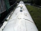 Used International Production Specialists Tank, Approximately 30,000 Gallons. Double wall, carbon steel, horizontal, flat heads.  12' Diameter x 490