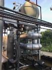 Used-  CMC Letco Industries Storage Pressure Vessel with Internal Helic Pipe Coi