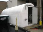 Used Corn Syrup Storage Tank, 6,000 gallon, carbon steel coated, horizontal. 26' long x 8' wide x 8.5' high, dished ends. Tank is mounted on a common frame with a weather cover. Overall dims: 26'3