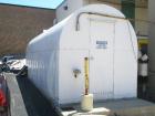 Used Corn Syrup Storage Tank, 6,000 gallon, carbon steel coated, horizontal. 26' long x 8' wide x 8.5' high, dished ends. Tank is mounted on a common frame with a weather cover. Overall dims: 26'3