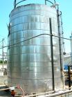 USED: Wolfe Mechanical and Equipment tank, 13,600 gallon, carbon steel, vertical. Approximate 144