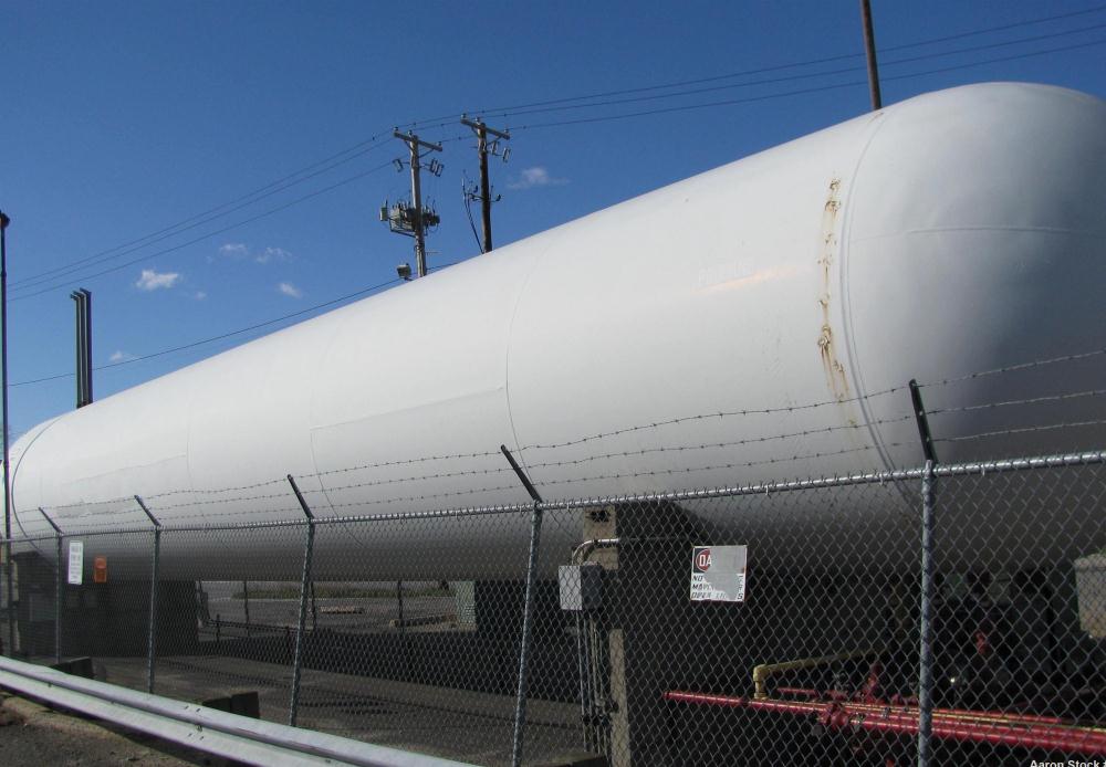 Used Trinity Industries Propane Tank, 30,000 gallon, carbon steel. Concrete saddles.