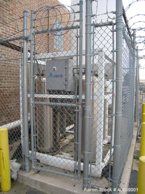 Used Liquid Nitrogen (LNG) / Oxygen Tank (LOX) and Vaporizer. MVE Inc Tank, model VS-1500-NS-250. Rated full vacuum/ 250 psi @ 100 deg F. Vertical.