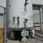 Used Tomco 30 ton vertical CO2 tank, model 3081VA. Urethane insulated, manufactured in 2000, 60,000 lbs (27,216 kg) capacity. 35'10