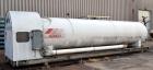 Used Airco Industrial Gases Horizontal Liquid Carbon Dioxide Storage Tank, Carbon Steel. 12 Ton CO2 capacity (24,000#), operating pressure 300 psig. Insulated,  R12 refrigerant. Mounted on a carbon s...