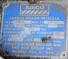 Used Airco Industrial Gases Horizontal Liquid Carbon Dioxide Storage Tank, Carbon Steel. 12 Ton CO2 capacity (24,000#), operating pressure 300 psig. Insulated,  R12 refrigerant. Mounted on a carbon s...