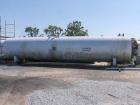 Used CO2 tank, certified by Tomco Equipment Co, manufacture date 1984, holds 76,000 lbs, carbon steel, approximately 39' long x 9' tall x 6'6