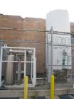 Used Liquid Nitrogen (LNG) / Oxygen Tank (LOX) and Vaporizer. MVE Inc Tank, model VS-1500-NS-250. Rated full vacuum/ 250 psi @ 100 deg F. Vertical.