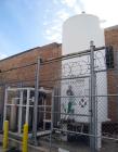Used Liquid Nitrogen (LNG) / Oxygen Tank (LOX) and Vaporizer. MVE Inc Tank, model VS-1500-NS-250. Rated full vacuum/ 250 psi @ 100 deg F. Vertical.