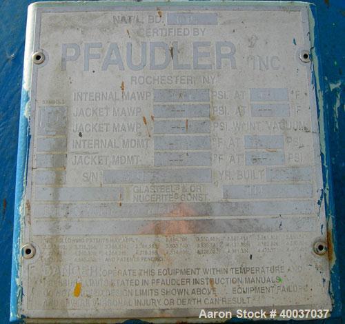 Used: Pfaudler glass lined tank, 2000 gallon, 9114 blue glass, horizontal. Approximately 84" diameter x 6' straight side, dished heads. Internal rated 35/fv at 450 deg.f.. Openings top (3) 3",(3)4"4"...