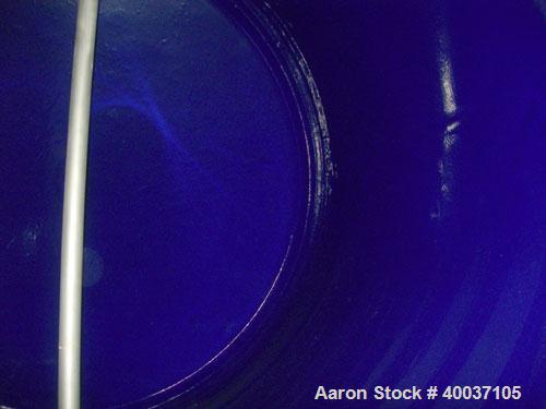 Used Pfaudler Glass Lined Tank, 2000 gallon, 9114 blue glass, horizontal. Approximately 84" diameter x 6' straight side, dished heads. Internal rated 35/fv at 450 deg F. Opening: top, various nozzles...