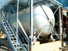Used: Pfaudler glass lined tank, 10,000 gallon, 9119 blue glass, horizontal. Approximately 10' diameter x 14' straight side, dished heads. Internal rated 50/fv at 450 deg.f.. Openings top (6) 4