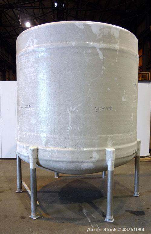 Used Ohio GRP Fiberglass Storage Tank, 2000 Gallons, Vertical. Approximately 84" diameter x 76" straight side, dished top and bottom. Liner and resin 1 ply "C" veil/ Atlac 4010-A. 1.3 Specific gravit...
