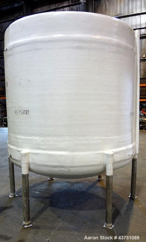 Used Ohio GRP Fiberglass Storage Tank, 2000 Gallons, Vertical. Approximately 84" diameter x 76" straight side, dished top and bottom. Liner and resin 1 ply "C" veil/ Atlac 4010-A. 1.3 Specific gravit...
