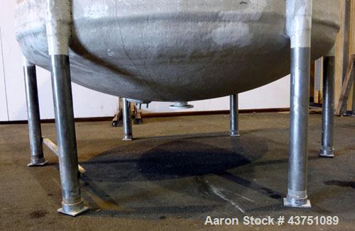 Used Ohio GRP Fiberglass Storage Tank, 2000 Gallons, Vertical. Approximately 84" diameter x 76" straight side, dished top and bottom. Liner and resin 1 ply "C" veil/ Atlac 4010-A. 1.3 Specific gravit...