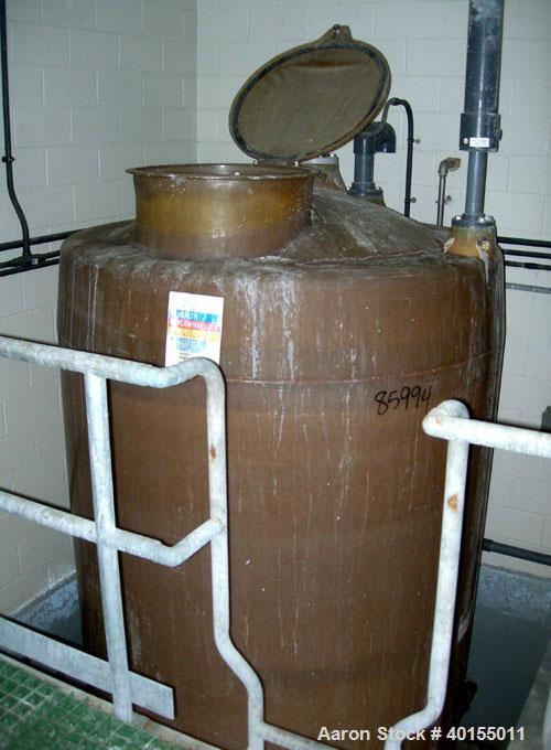 Used:  Raven tank, 1800 gallon, fiberglass, vertical. Approximate 72" diameter x 99" straight side. Dished top and bottom. Top manway with cover, approximate 3" center bottom outlet. Mounted on 4 sta...