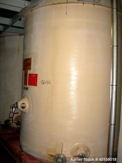 Used:  Justin tank, 3500 gallon, fiberglass, vertical. Approximate 84" diameter x 148" straight side. Dished top, flat bottom. 23" top manway with cover, side bottom outlet. Built 1986.