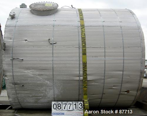 USED: Tank, 6200 gallon, fiberglass, vertical. Approximately 116" diameter X 136" straight side. Slight cone top, flat bottom. Openings:  top 2", (3) 1", 24" manway, no cover, side bottom 24" side ma...