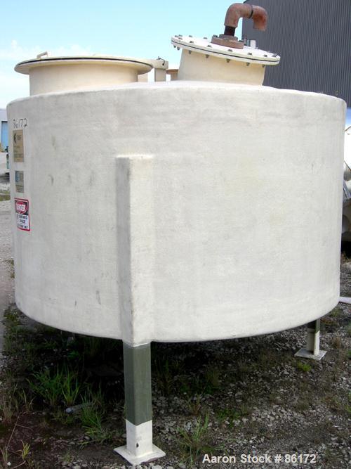 Used Empire Tank, 1200 Gallon, Fiberglass, Vertical. Approximate 84" diameter x 48" straight side. Dish top and bottom. Openings: top 2", 3", 24" manway with bolt down cover; 3" center bottom outlet....