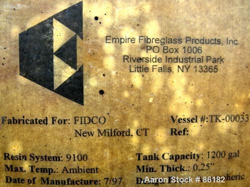 USED: Empire Products tank, 1200 gallon, fiberglass, horizontal. Approximate 58" diameter x 92" straight side. 1 dished end, 1 flat end. Top openings: (4) 3" flange, (1) 24" manway with bolt-on cover...
