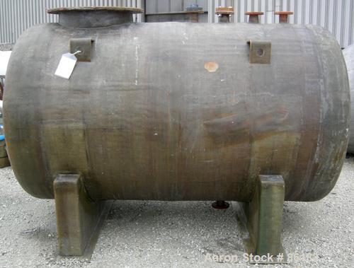 USED: Empire Products tank, 1200 gallon, fiberglass, horizontal. Approximate 58" diameter x 92" straight side. 1 dished end, 1 flat end. Top openings: (4) 3" flange, (1) 24" manway with bolt-on cover...