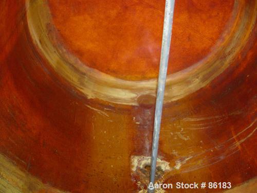 USED: Empire Products tank, 1200 gallon, fiberglass, horizontal. Approximate 58" diameter x 92" straight side. 1 dished end, 1 flat end. Top openings: (4) 3" flange, (1) 24" manway with bolt-on cover...