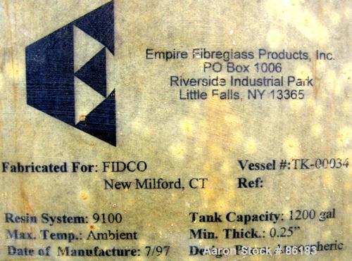 USED: Empire Products tank, 1200 gallon, fiberglass, horizontal. Approximate 58" diameter x 92" straight side. 1 dished end, 1 flat end. Top openings: (4) 3" flange, (1) 24" manway with bolt-on cover...