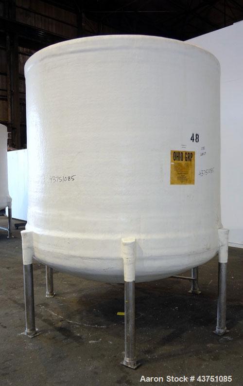 Used Ohio GRP Fiberglass Storage Tank, 2000 Gallons, Vertical. Approximately 84" diameter x 76" straight side, dished top and bottom. Liner and resin 1 ply "C" veil/ Atlac 4010-A. 1.3 Specific gravit...