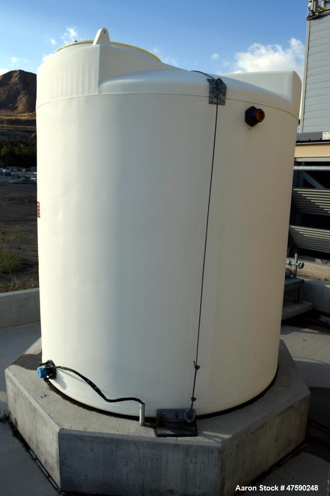 Unused- PolyProcessing Polyethylene Tank, 2000 Gallon, Vertical. Approximate 85" diameter x 97" straight side, dished top, flat bottom. Serial# L-12-01046, built 2012.