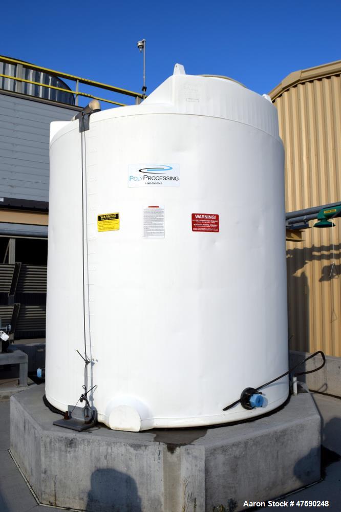 Unused- PolyProcessing Polyethylene Tank, 2000 Gallon, Vertical. Approximate 85" diameter x 97" straight side, dished top, flat bottom. Serial# L-12-01046, built 2012.