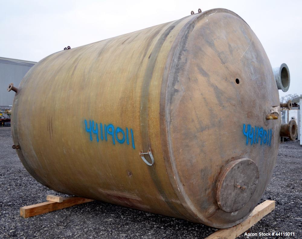 Used Warner Fiberglass Products Tank, Approximate 5000 Gallon, Vertical. Approximate 108" Diameter x 128" straight side, dished top, flat bottom.  Openings top 2", 6", 12", 20" man way with cover. 2"...