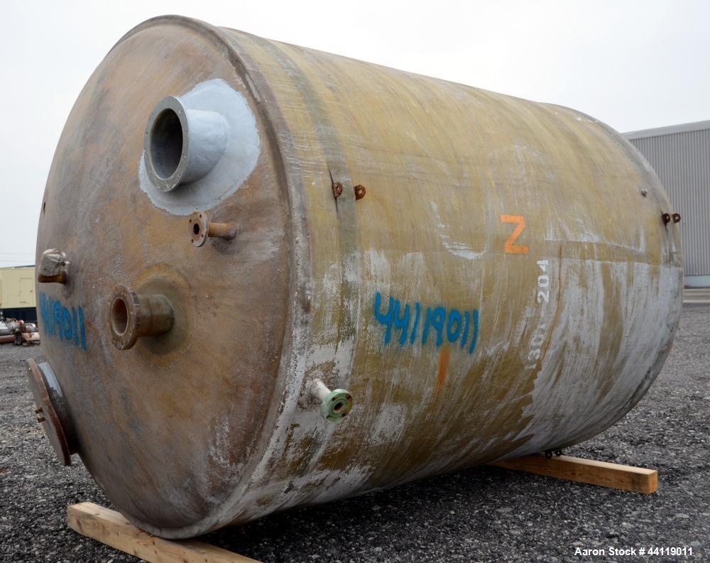 Used Warner Fiberglass Products Tank, Approximate 5000 Gallon, Vertical. Approximate 108" Diameter x 128" straight side, dished top, flat bottom.  Openings top 2", 6", 12", 20" man way with cover. 2"...