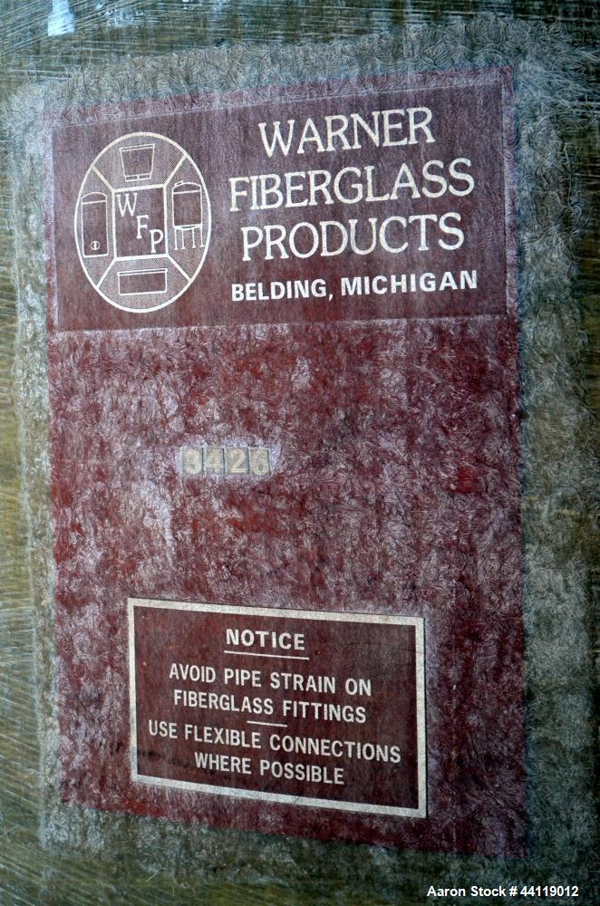 Used Warner Fiberglass Products Tank, Approximate 8000 Gallon, Vertical. Approximate 114" Diameter x 192" straight side, dished top, flat bottom.  Openings top 3", 20" man way with cover. 3" Side bot...