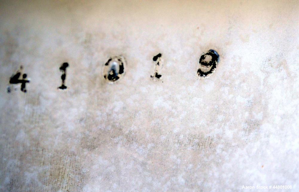 Used SSI Snyder Industries Polypropylene Tank, approximately 5000 gallons, vertical. Approximately 144" diameter x 78" straight side, dished top, flat bottom, top manway, side bottom outlet.  Serial ...