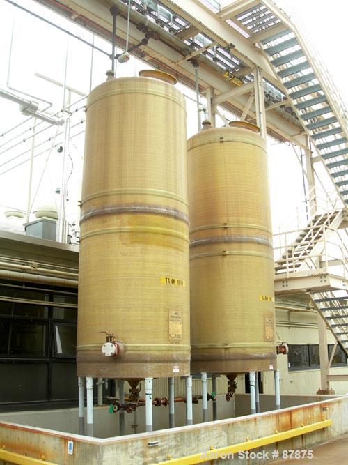 USED: Viatec tank, 3421 gallon, fiberglass, vertical. 72" diameter X 14' straight side, dished top and bottom. Internal rated atmos at 150 deg F. Top manway, center bottom outlet. Mounted on 6 legs. ...