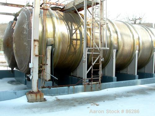 USED: Wallace Murray tank, 34,000 gallon, fiberglass, horizontal. Approx 144" diameter x 40' long. Dished ends. End bottom outlet. Mounted on carbon steel saddles.