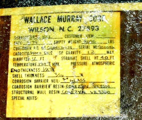 USED: Wallace Murray tank, 34,000 gallon, fiberglass, horizontal. Approx 144" diameter x 40' long. Dished ends. End bottom outlet. Mounted on carbon steel saddles.