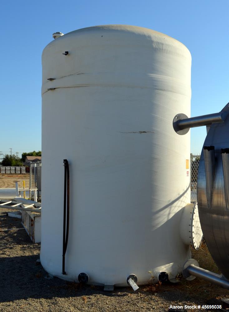 Used Xerxes Fiberglass Tank, 4030 Gallon, 20 MIL C-Glass, Verical. Approximate 96" diameter x 132" straight side, dished top, flat bottom. Top openings (2) approximate 3", side bottom man way with co...