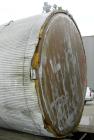 USED: Tank, 6200 gallon, fiberglass, vertical. Approximately 116