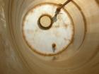 USED: Empire Products tank, 10,000 gallon, fiberglass, vertical. Approximate 9' diameter x 256