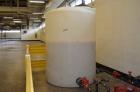 Used Poly Processing Company Vertical Poly Storage Tank, 1,100 Gallon. (3) 4” Diameter Side Bottom Inlets and Outlets, approximate 18” diameter top covered man way.