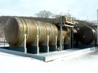 USED: Wallace Murray tank, 34,000 gallon, fiberglass, horizontal. Approx 144