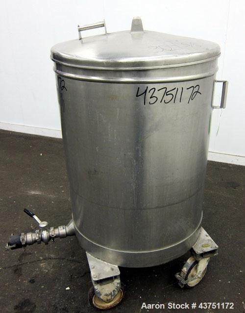 Used Tank, 100 Gallon, 304 Stainless Steel, Vertical.  Approximately 31" diameter x 38" straight side.  Open top with a 1 piece cover, 1" sloped bottom.  2-1/4" Side bottom outlet.  Skirt mounted wit...