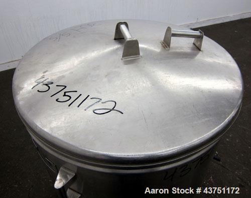 Used Tank, 100 Gallon, 304 Stainless Steel, Vertical.  Approximately 31" diameter x 38" straight side.  Open top with a 1 piece cover, 1" sloped bottom.  2-1/4" Side bottom outlet.  Skirt mounted wit...
