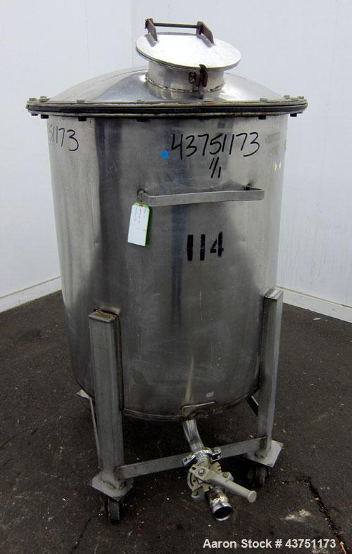Used Tank, 100 Gallon, 304 Stainless Steel, Vertical.  30" Diameter x 34" straight side.  Dished bolt-on top with an 8" hand hole with cover, 2" sloped bottom.  2" Tri-clamp off center bottom outlet....
